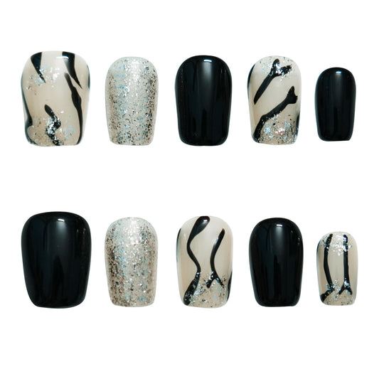Tesytto Marble press-on nails with zebra print and silver glitter for a bold glossy look