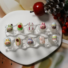 Tesytto mini bow charms nails with pastel tones for playful outfits