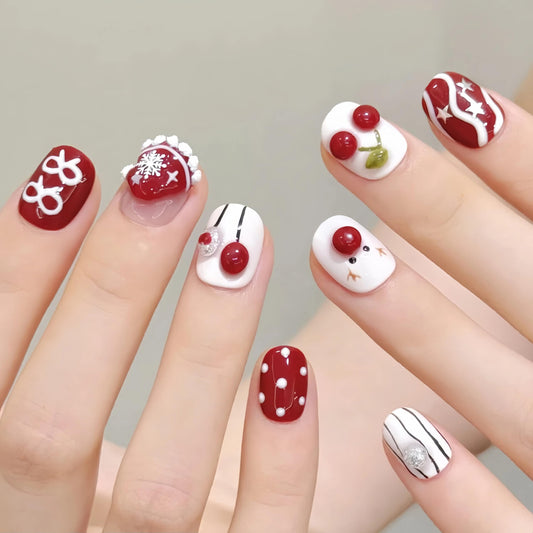 Tesytto nails featuring reindeer 3D design for playful holiday style.