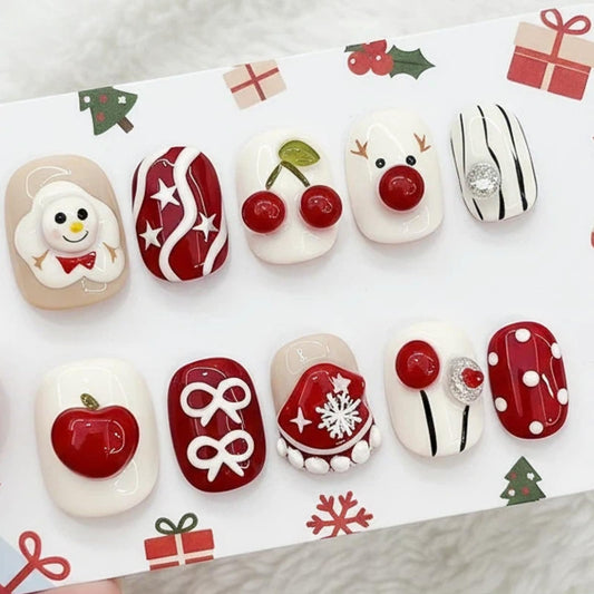 Tesytto nails featuring snowman 3D design for festive charm and depth.