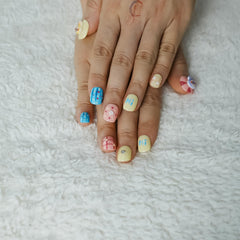 Tesytto polka dot nails soft pastels for cute casual wear.