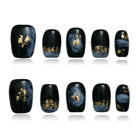 Tesytto short coffin nails with black base, blue ombre and gold foil for bold style