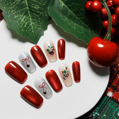 Tesytto Valentine red cat-eye nails in short coffin shape with glossy depth.