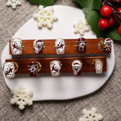 White snowflake 3D design on Tesytto nail for a wintry look