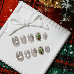 Tesytto Winter Bling nails with silver glitter finish for party-ready shine.