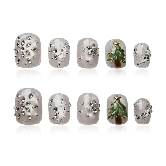 Tesytto Winter Bling nails with a 3D snowflake design for a festive manicure.