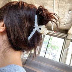 Textention three-pack packaging with clips and ties
