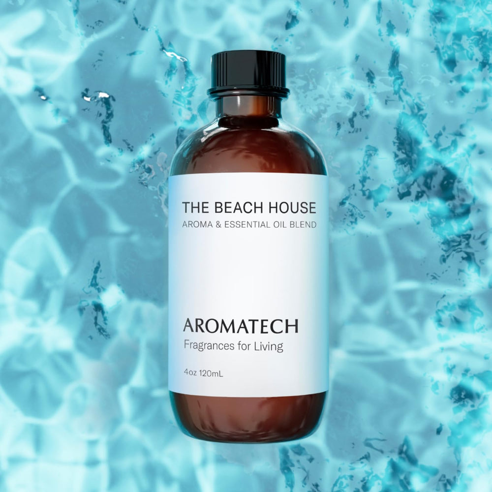 Close-up of The Beach House bottle label featuring Bergamot, Coconut Milk, and Sandalwood notes