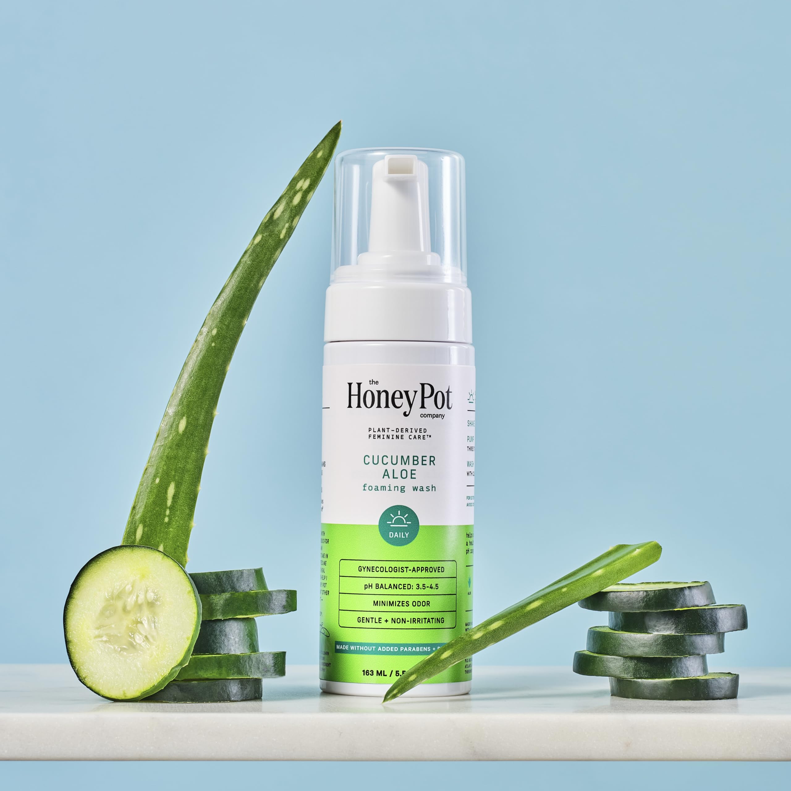 The Honey Pot Company ingredients closeup cucumber aloe, ideal for soothing sensitive skin.