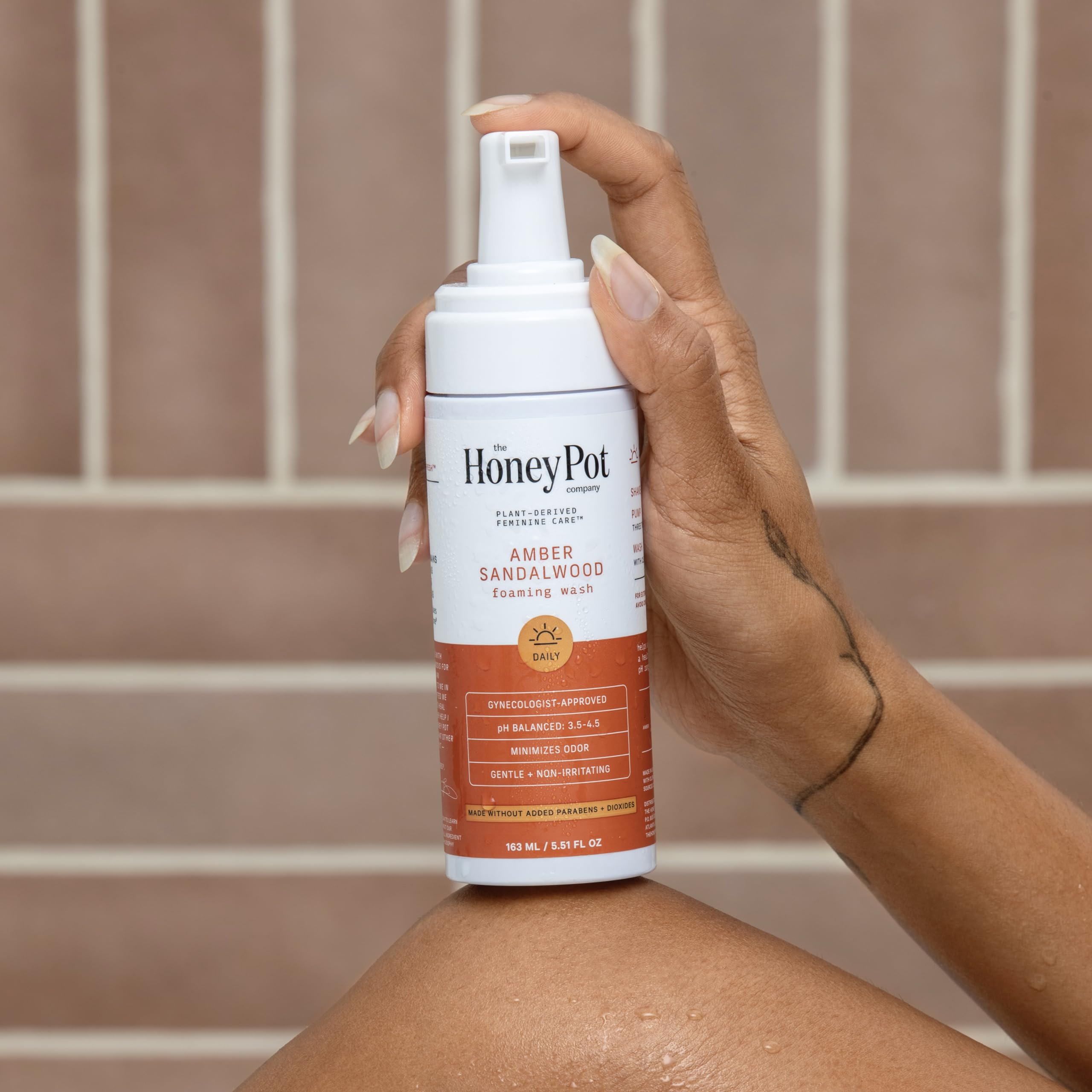 Foaming pump action image conveys easy, gentle cleansing with calming botanicals.