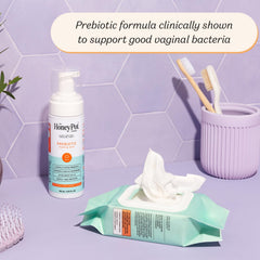 The Honey Pot Prebiotic Wash closeup label emphasizes plant-based hypoallergenic formula