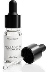 The Magic Scent Mahogany & Teakwood diffuser oil packaging and bottle
