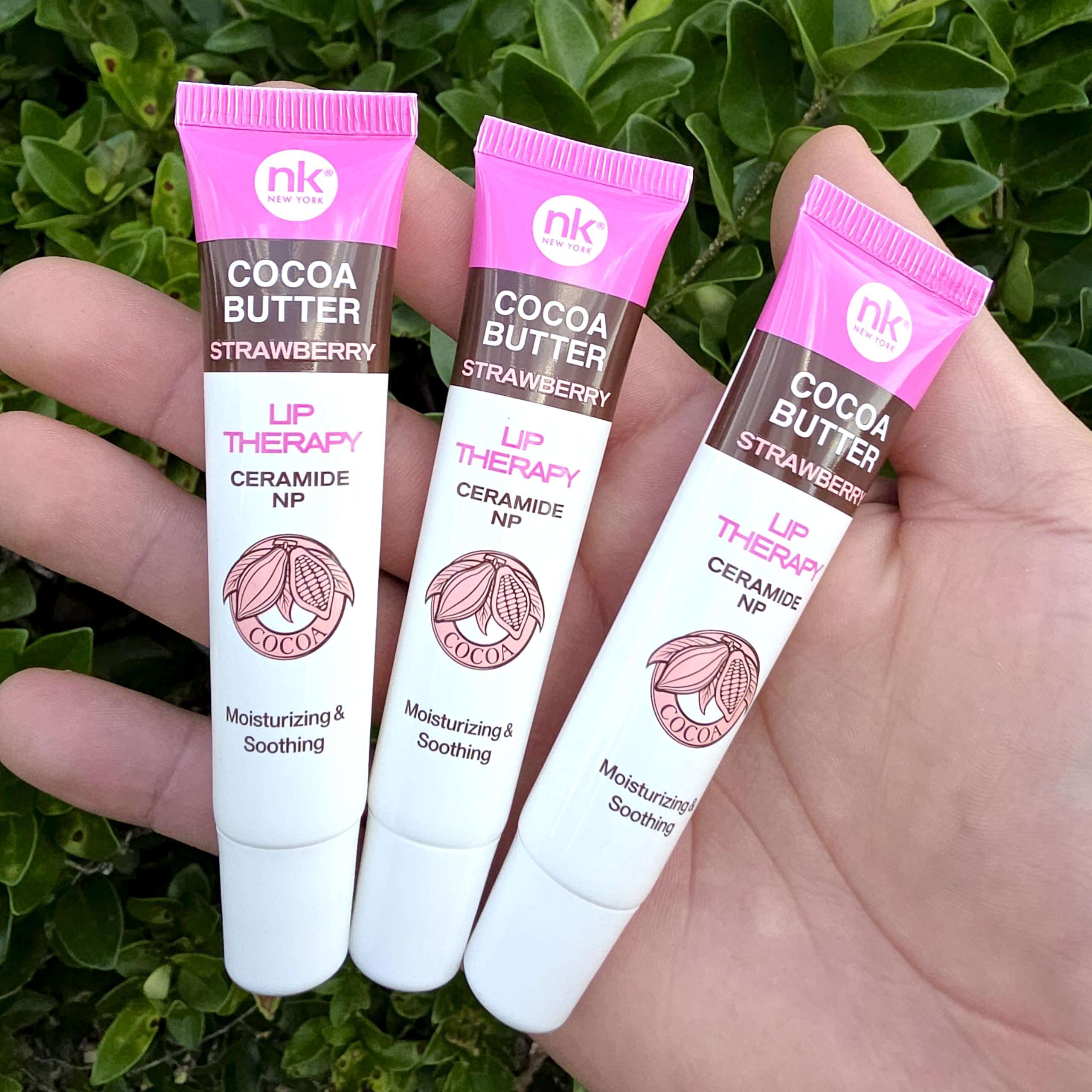 The Make-Up Artist Project Cocoa Butter Strawberry Lip Therapy jar provides rich moisture for dry lips.