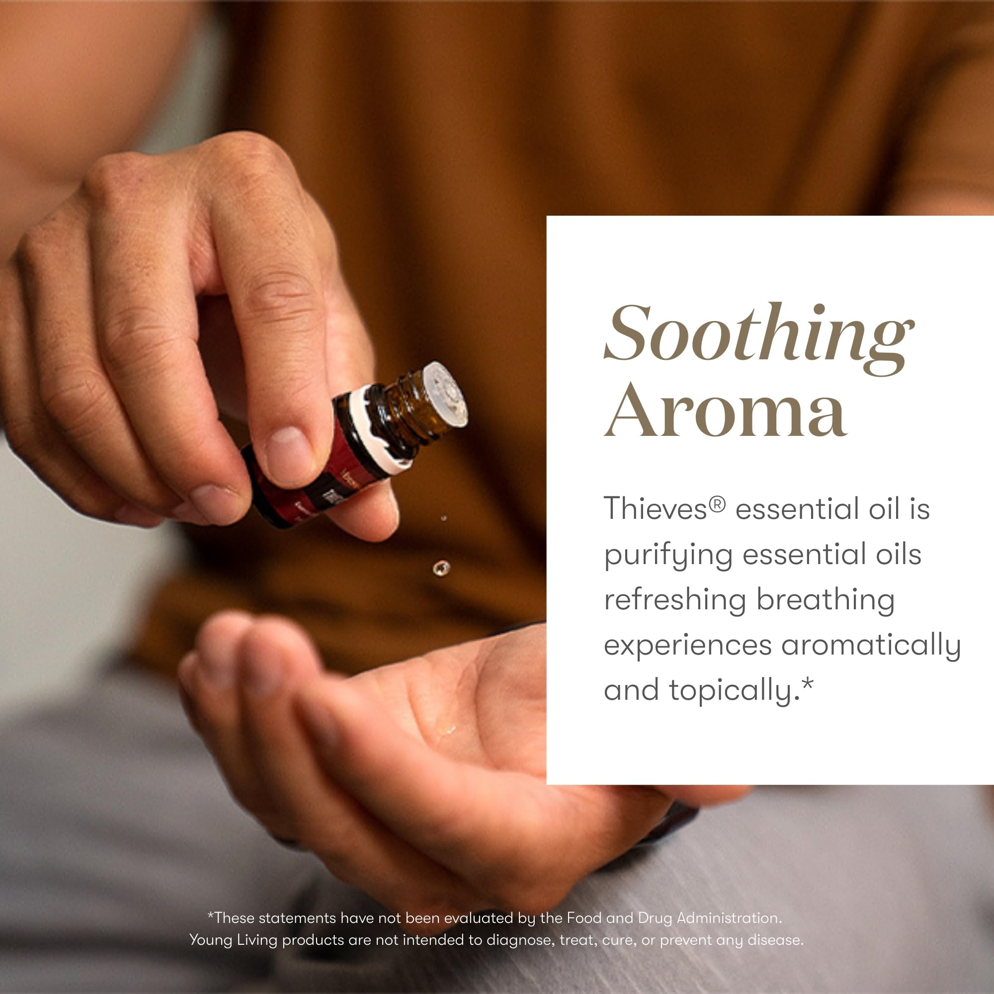 Young Living Thieves 5ml bottle on white background