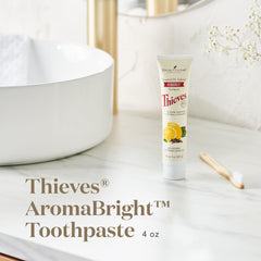 Close-up of Thieves AromaBright Toothpaste label with Young Living logo