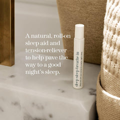 Hands holding the roll-on for bedside use