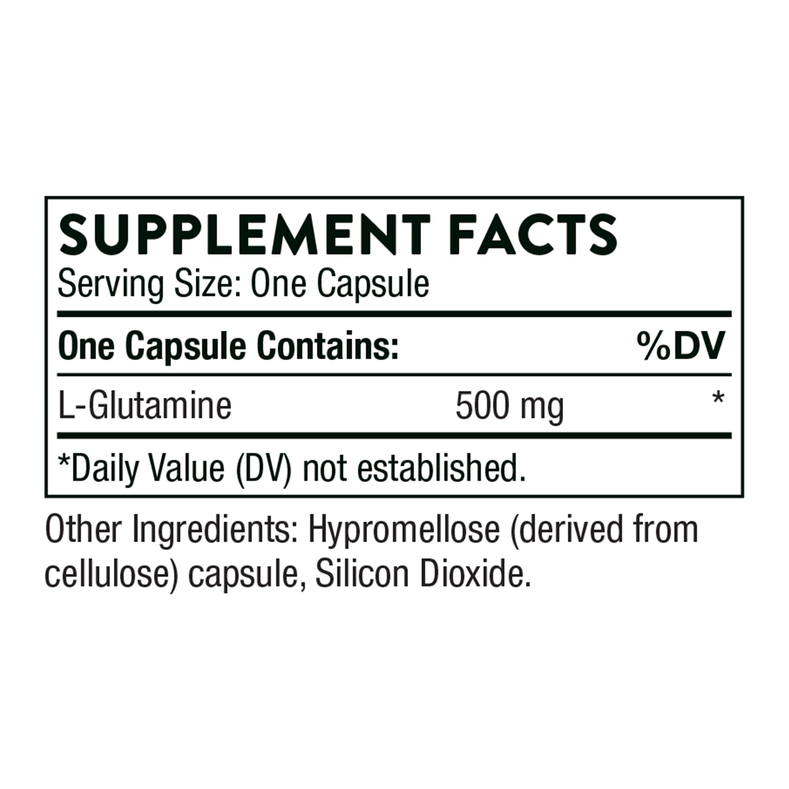L-Glutamine capsules beside the bottle