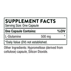 L-Glutamine capsules beside the bottle