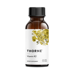 THORNE Vitamin K2 Liquid bottle front—everyday bone support with precise 1 mg drops.