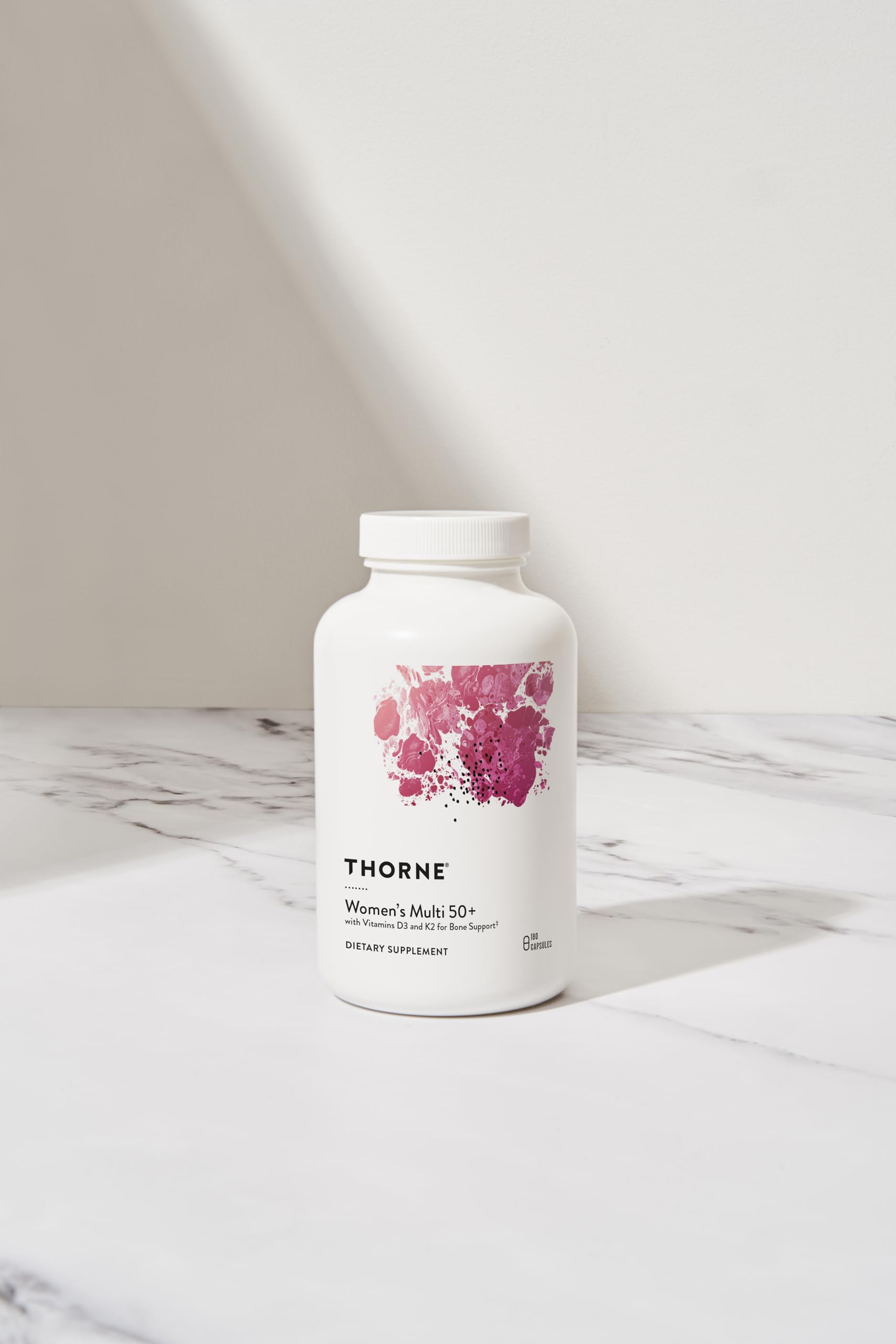 Packaging and bottle of THORNE Women's Multi 50+