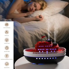 Thoughtalk cartoon ship diffuser top view features 7-color LEDs for ambient mood lighting.