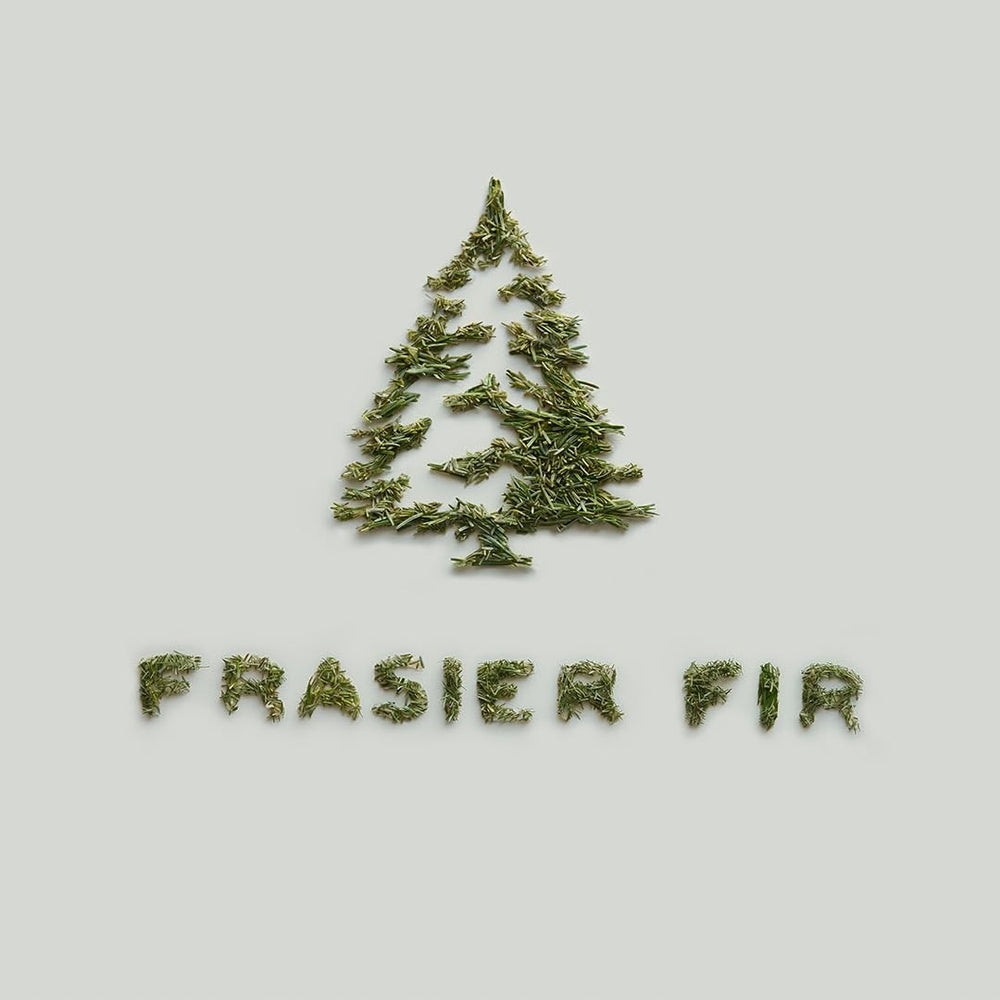 Decorative silver Thymes Frasier Fir candle in festive setting