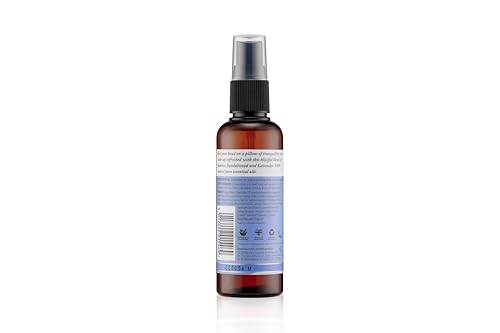 Tisserand Sleep Pillow Mist on pillow, delivering jasmine and sandalwood for a peaceful night.