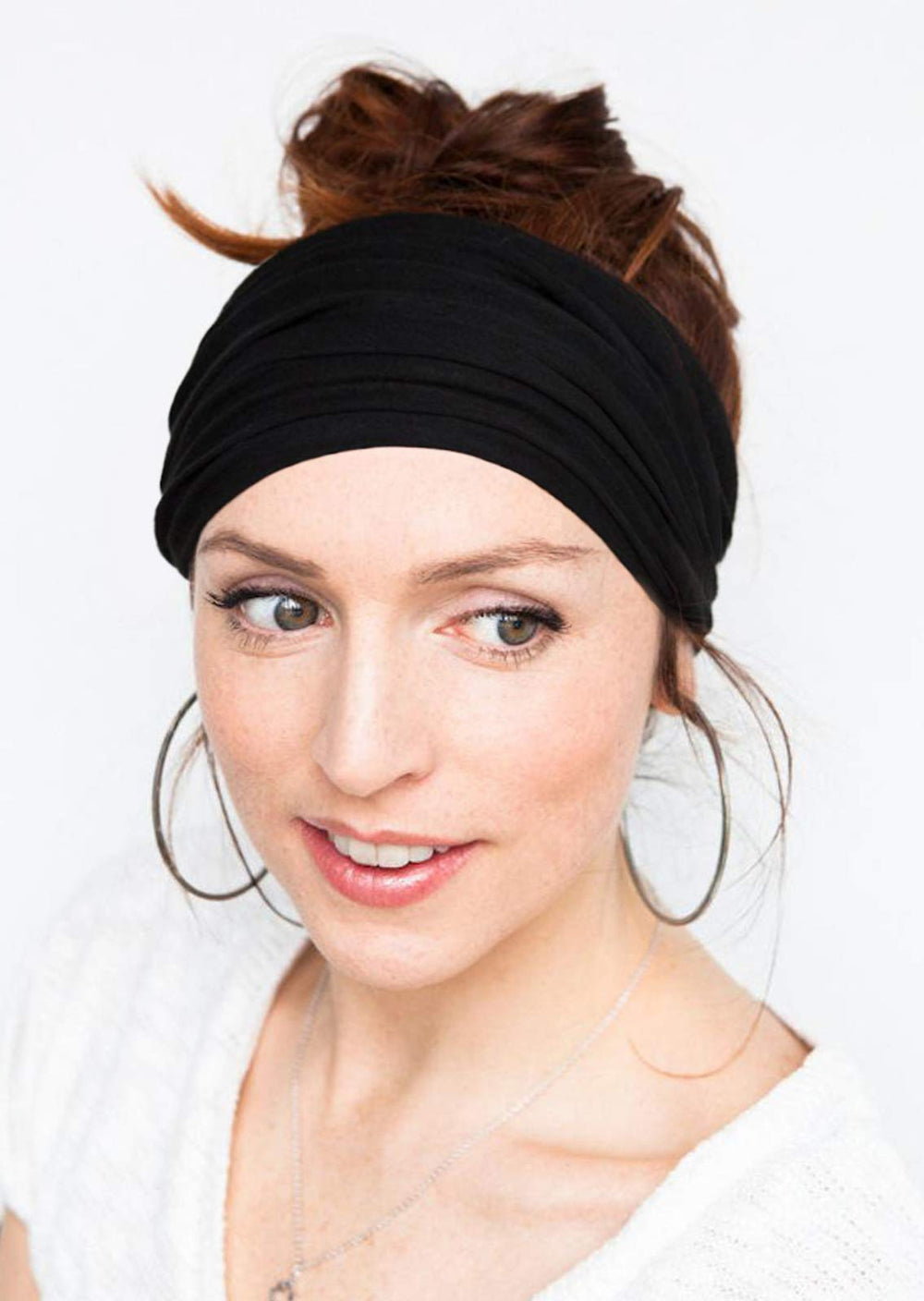 Tobeffect headband worn by a model with versatile knot styling ideas.