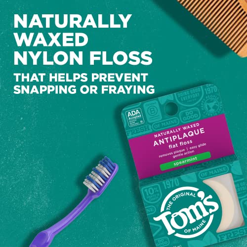 Close-up of Tom's of Maine floss label and waxed strands