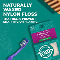Close-up of Tom's of Maine floss label and waxed strands