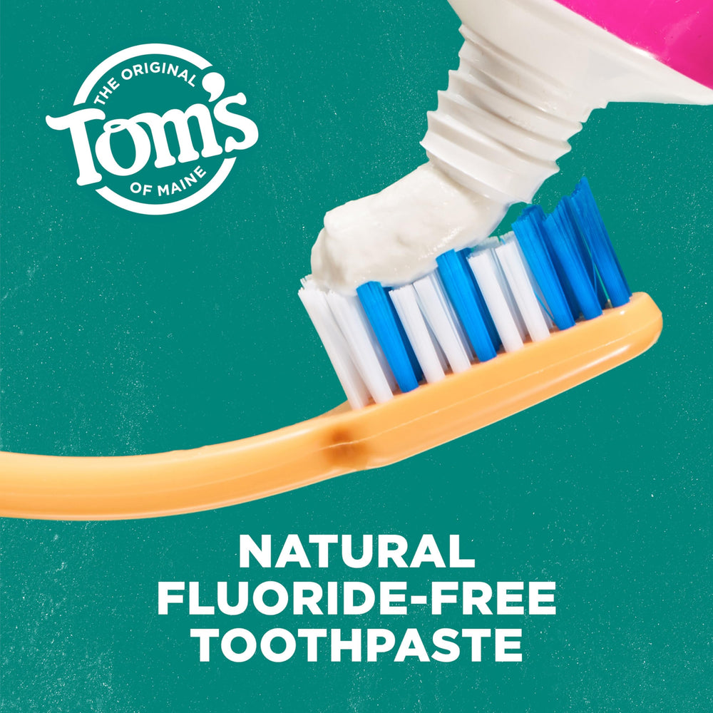 Close-up of toothpaste label showing fluoride-free whitening formula
