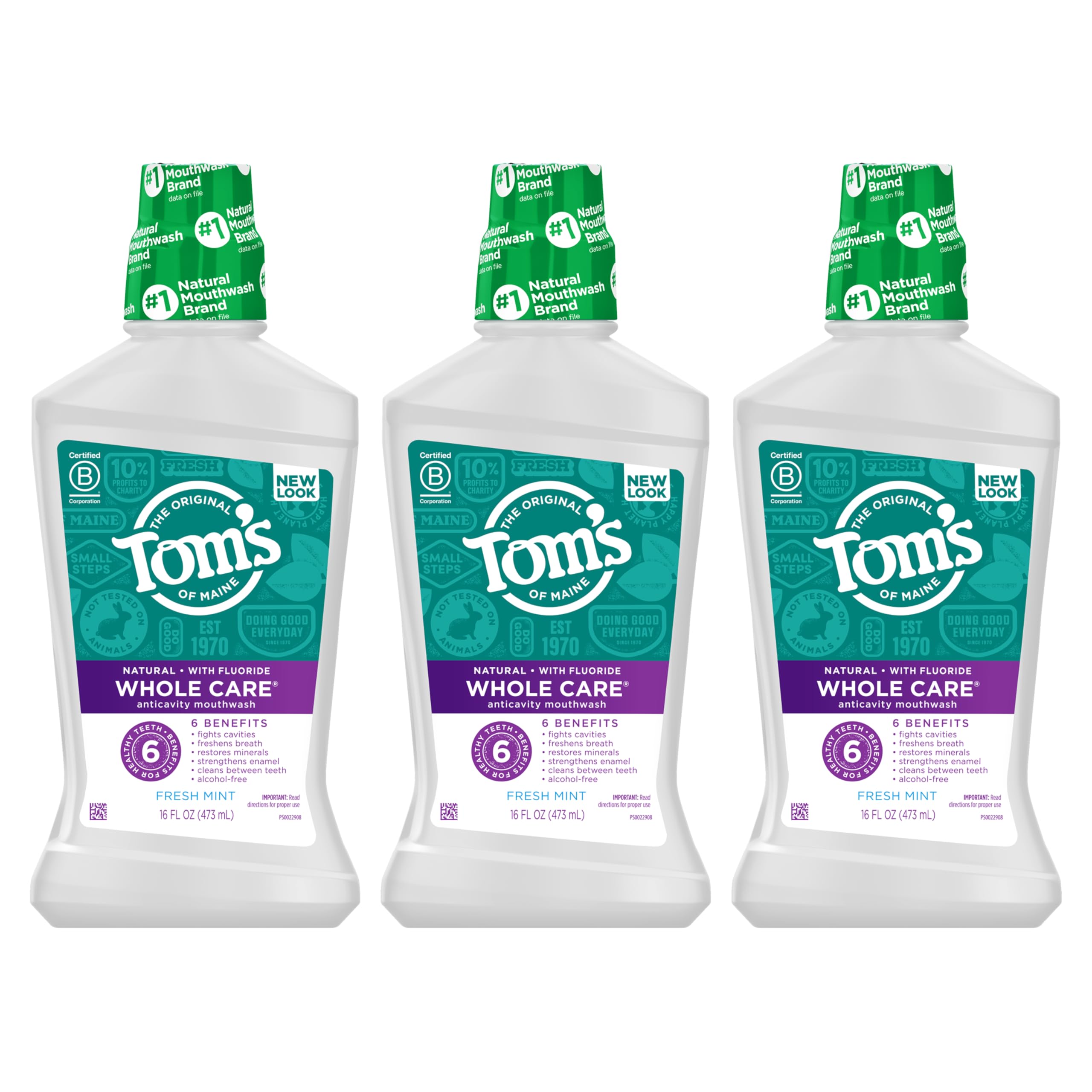 Clear bottle of Fresh Mint mouthwash with mint leaves in background