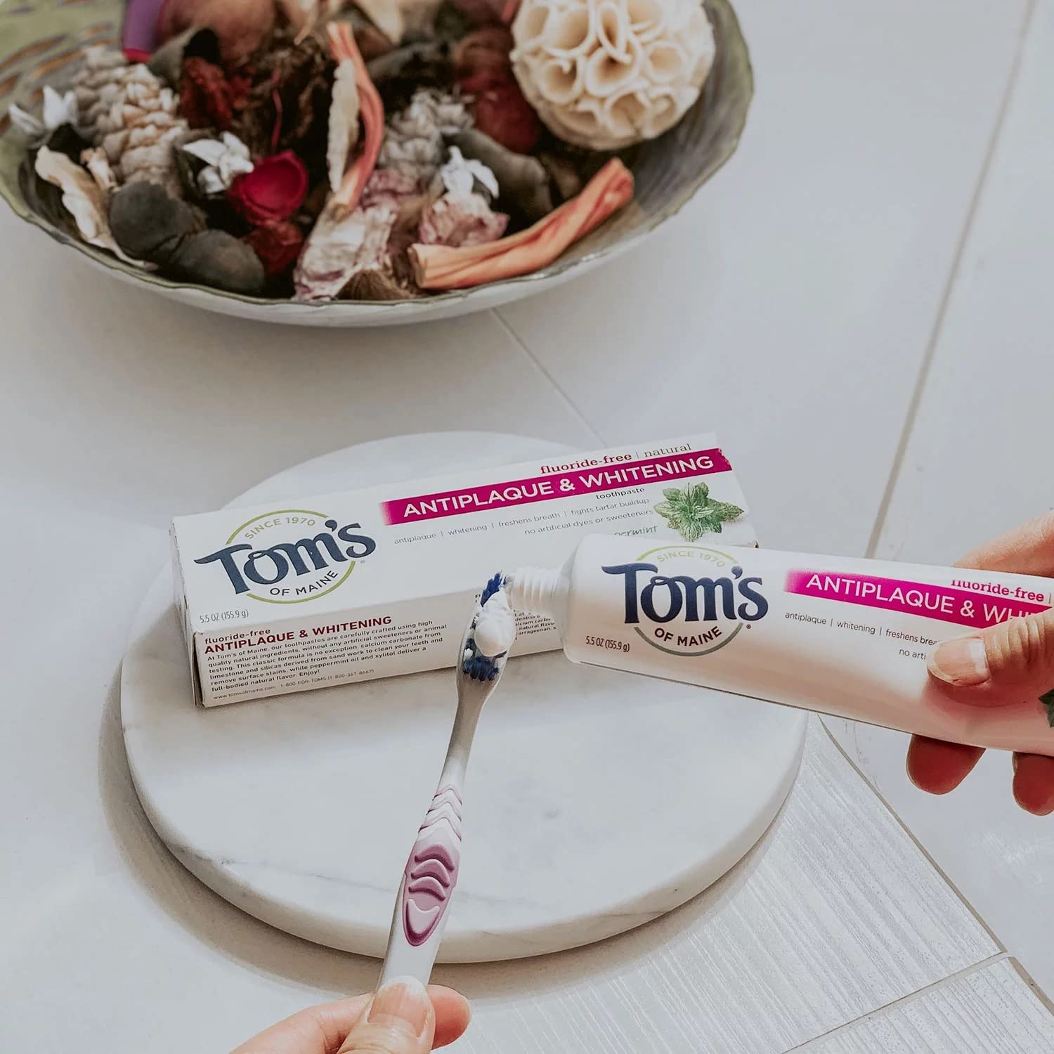 Bright smile achieved with Tom's of Maine fluoride-free toothpaste