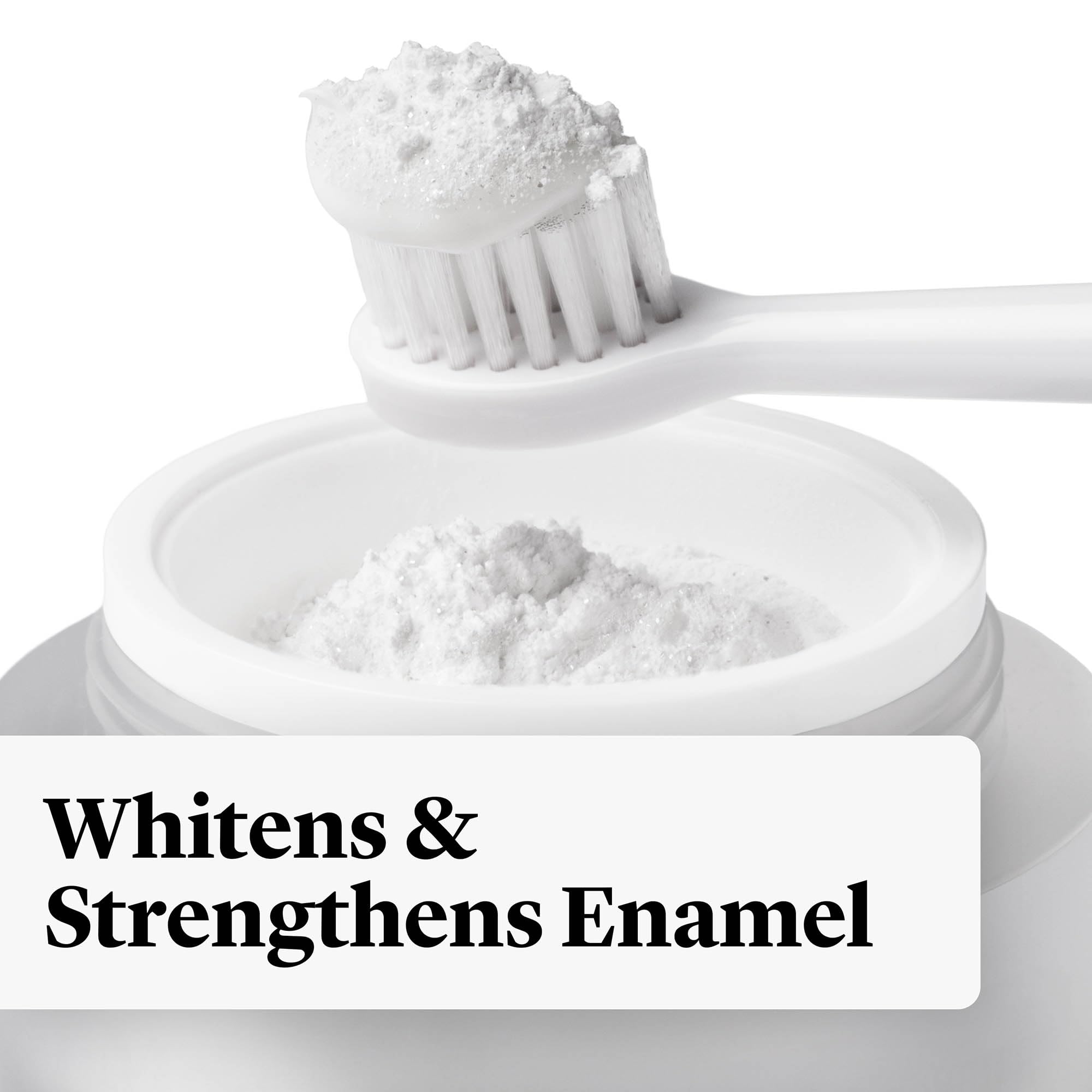 Toothbrush dipped into whitening powder for immediate whitening