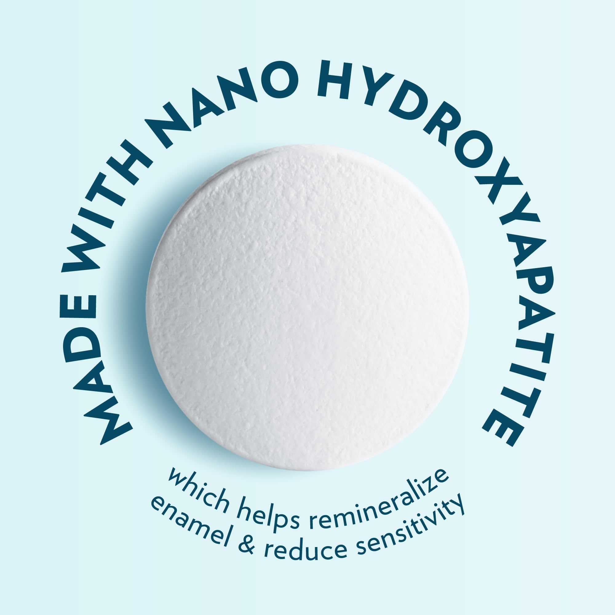 Close-up of a chewable toothpaste tablet dissolving