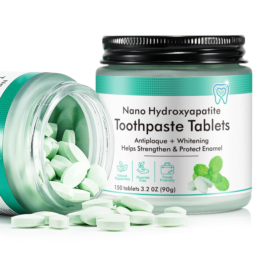 Chewable toothpaste tablets dissolving into mint foam