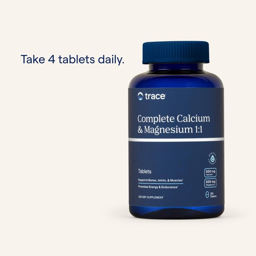 Lifestyle image with tablets and a glass of water
