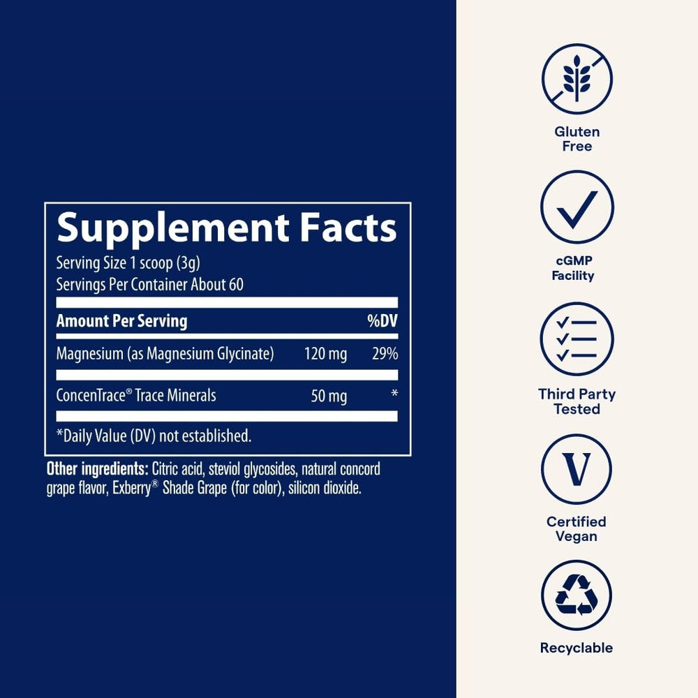Measuring scoop beside magnesium glycinate powder