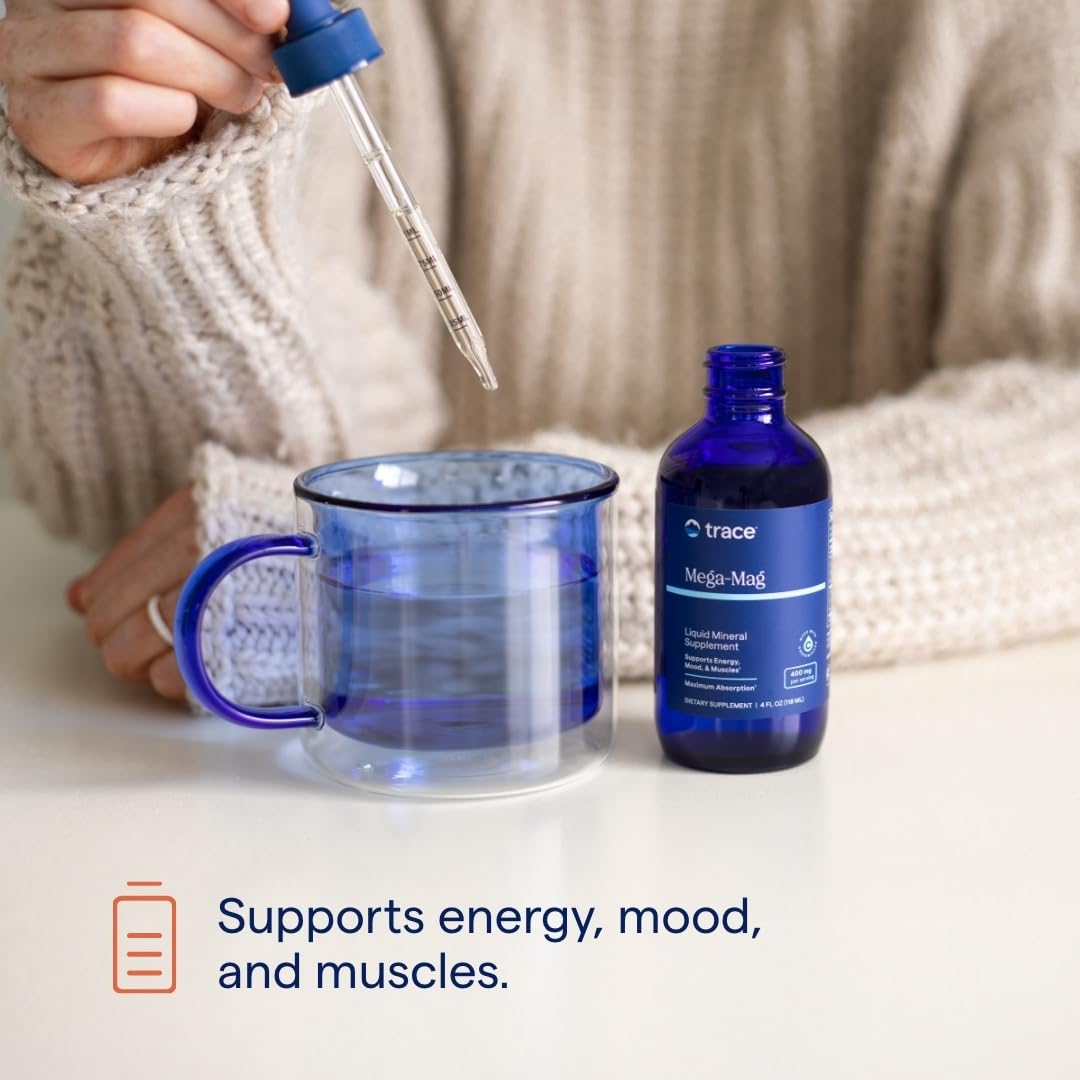 Trace Minerals Mega-Mag drops dispensed into water for quick energy support.
