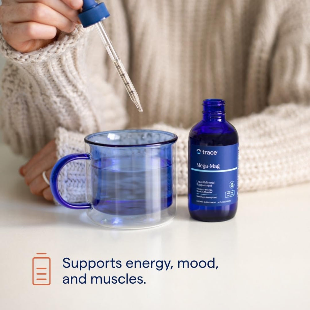 Trace Minerals Mega-Mag drops dispensed into water for quick energy support.