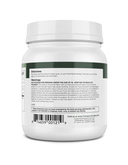Lifestyle image of a person mixing Prebiotic Greens for digestion support