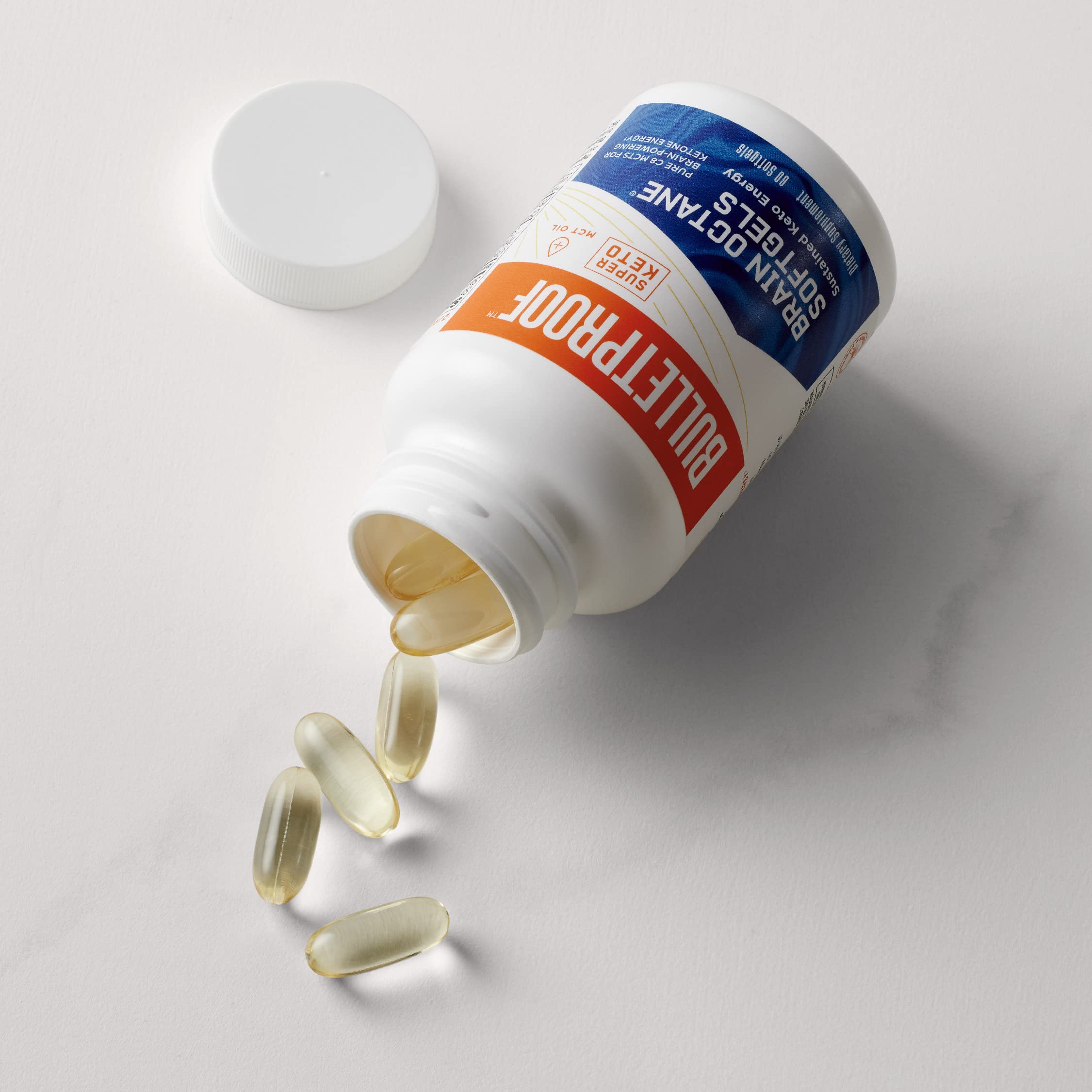 Travel-friendly Brain Octane Softgels bottle on a surface