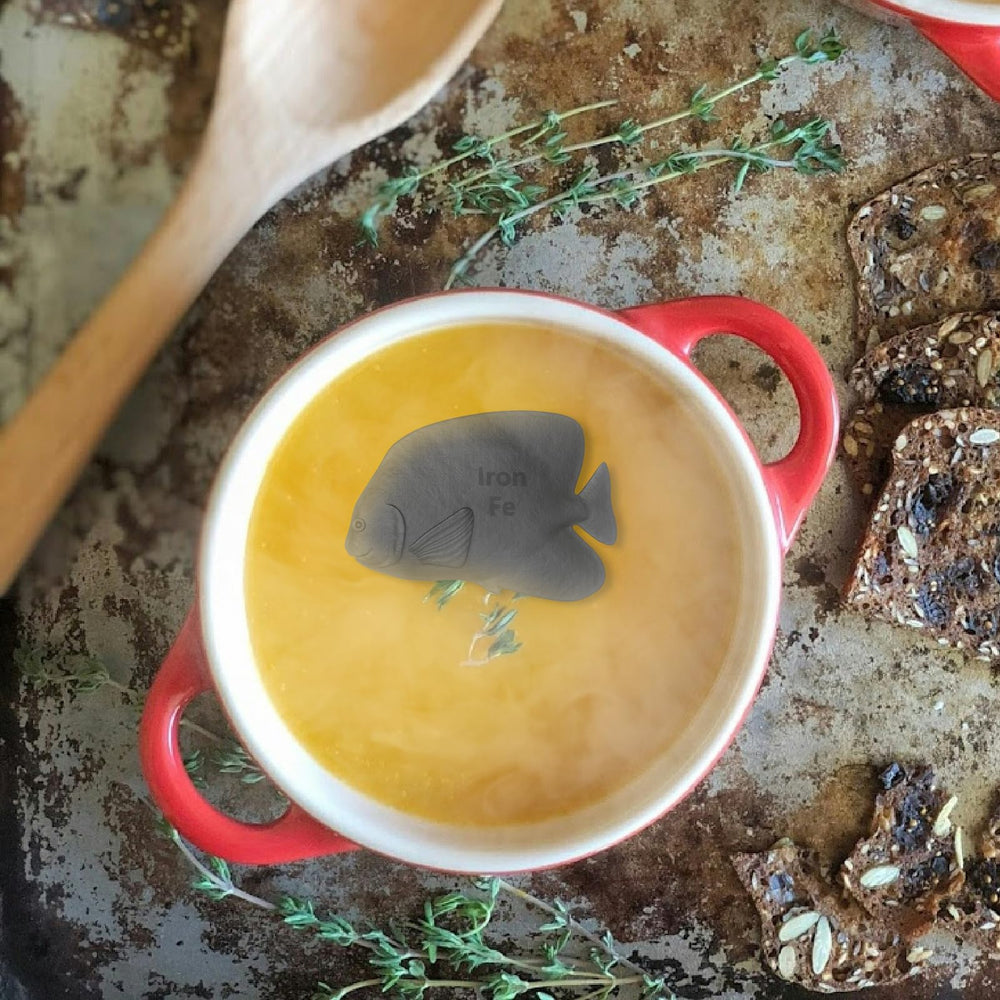 Travel-friendly Iron Fish used in camping setup