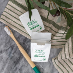 Travel-friendly box with six packs of dental tape