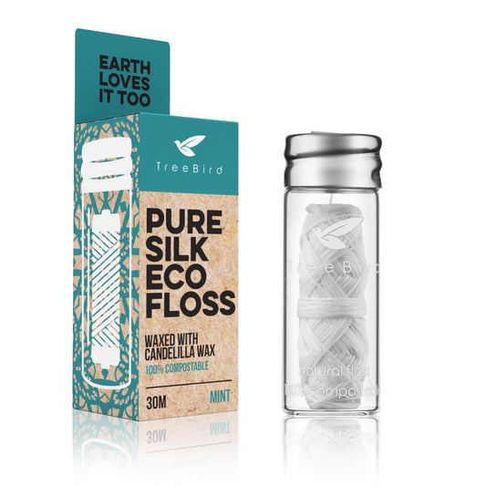 TreeBird Pure Silk Eco Floss in refillable glass dispenser with mint flavor