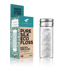 TreeBird Pure Silk Eco Floss in refillable glass dispenser with mint flavor