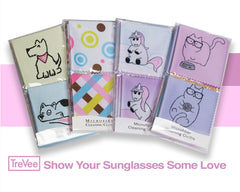 Assorted pastel microfiber cloths with dog designs on display