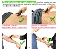 Hands holding the Trigger Point Stimulator Tool for scale