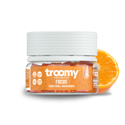 Bottle of Troomy Lion's Mane Focus Gummies with Tangerine & Passionfruit flavor on white background