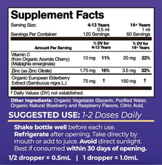 Close-up of the dropper dispensing vitamin drops